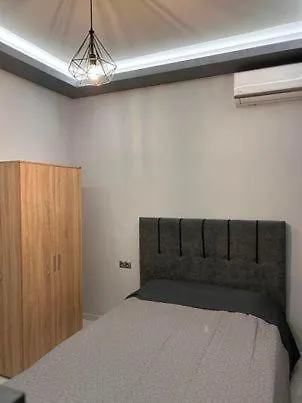 Greysuites Apartment